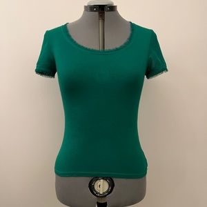 Jacob green t-shirt with sheer sleeves and a raw edge on the neck and sleeves.